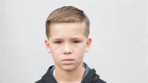 Can a 14 year old stay home alone overnight NYC?