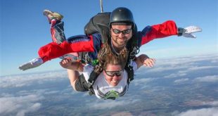 Do you have to be attached to someone when skydiving?